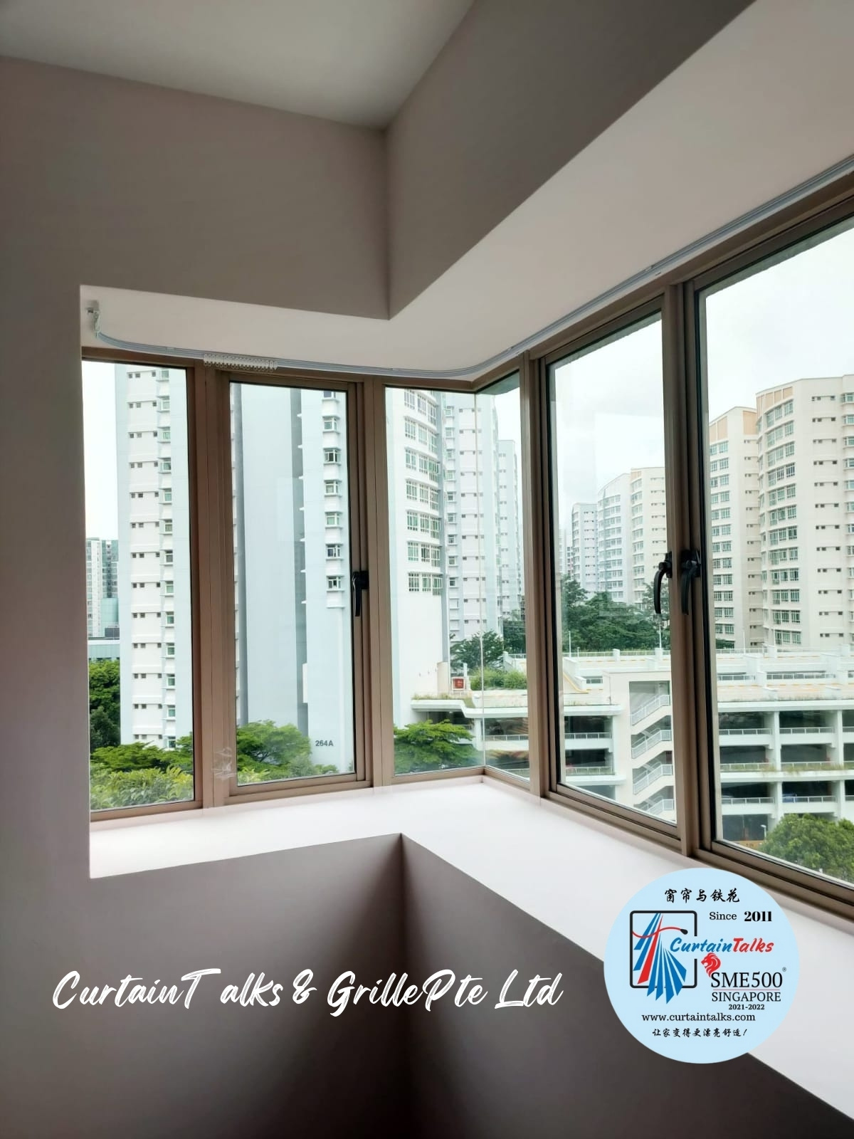 This is a Picture of White curved curtain track installed at Singapore condo, Rivervale